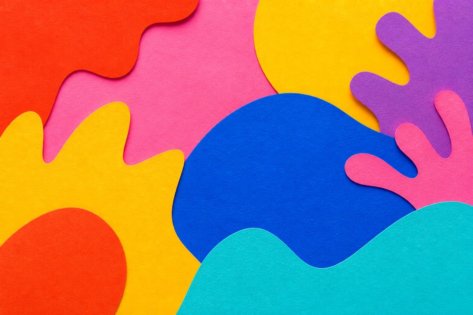 Bright abstract cut-paper shapes